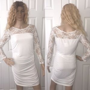 White dress with long lace sleeves